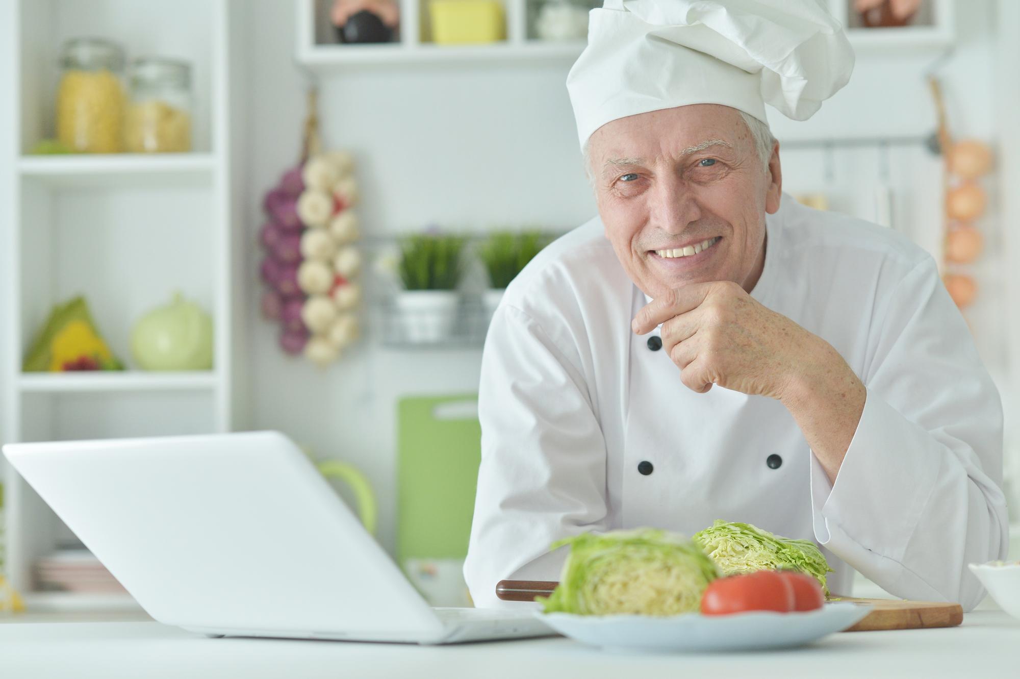 Chef smiling during online lesson